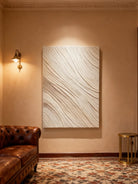 Plaster texture wall art displayed in contemporary living room, modern home decor setting