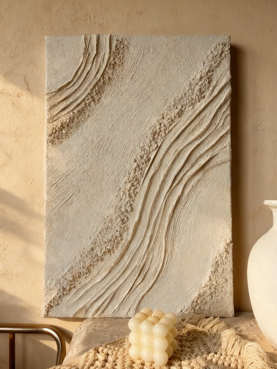 Textured plaster abstract wall art displayed in contemporary living room interior setting