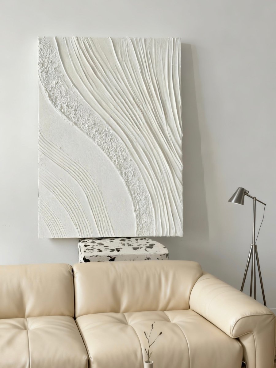 Textured plaster wall art displayed in contemporary living room, showcasing dimensional abstract painting