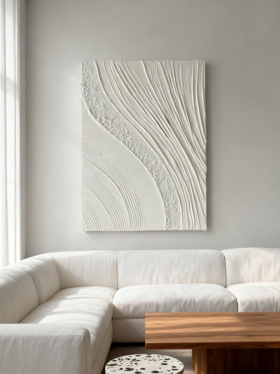 Textured plaster wall art displayed in contemporary living room, showcasing dimensional abstract painting