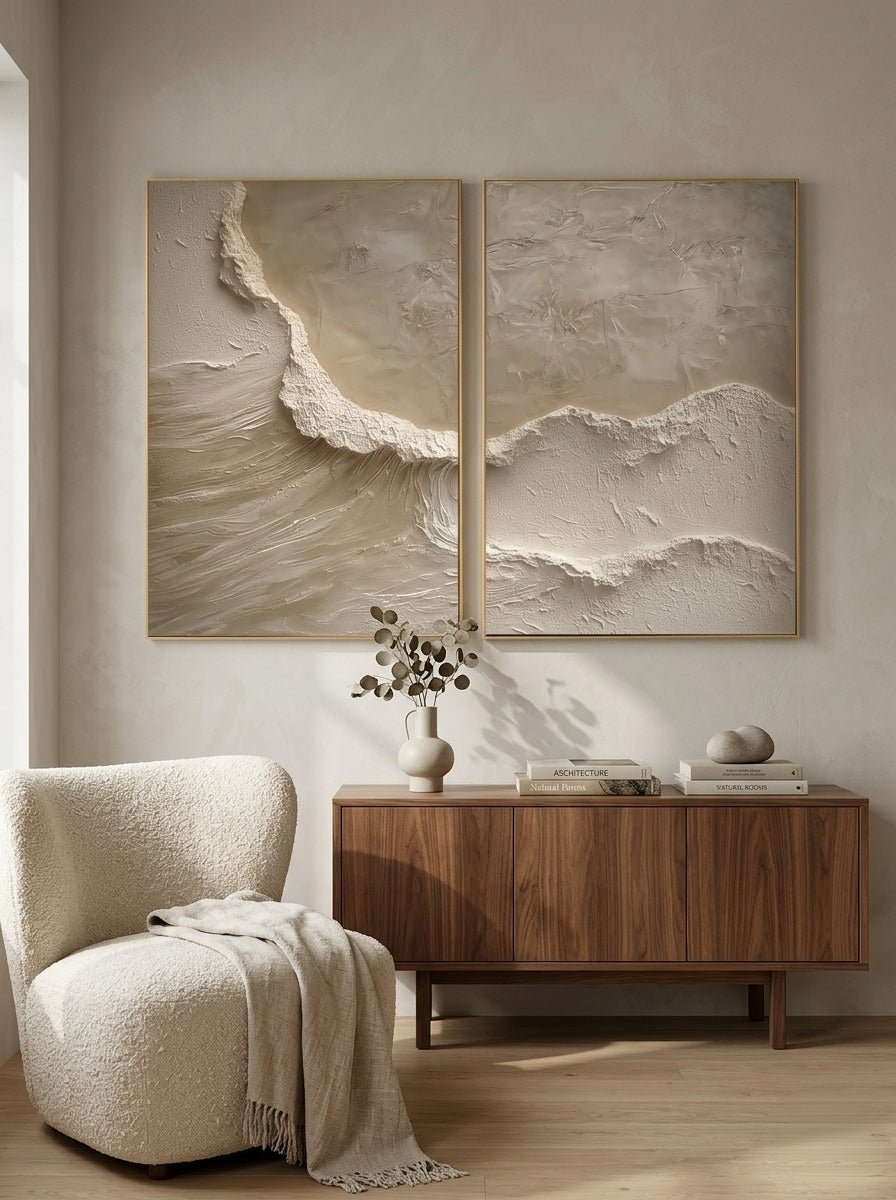 A large 2-panel modern Wabi-Sabi relief painting by Akari Kobayashi featuring organic 3D textured ridges in cream and beige, hung in a minimalist living room above a sofa.