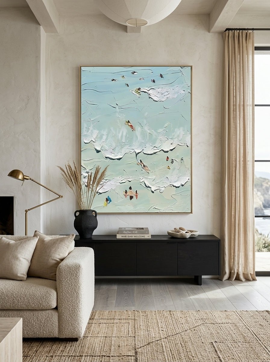 Hand-painted textured coastal surf wave wall art featuring ocean waves and surfers in soft aqua tones on canvas