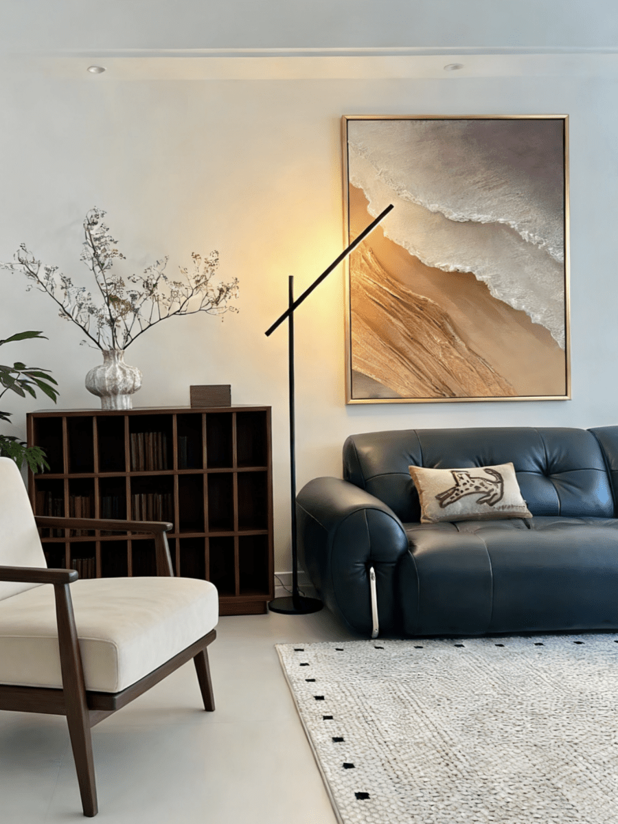 Hand-painted 3D textured abstract coastal painting featuring heavy sculpted ridges in sand beige and ochre in a gold floater frame.