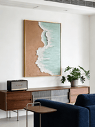 Hand-painted 3D textured beach painting with thick white seafoam ridges and turquoise water in a gold floater frame.