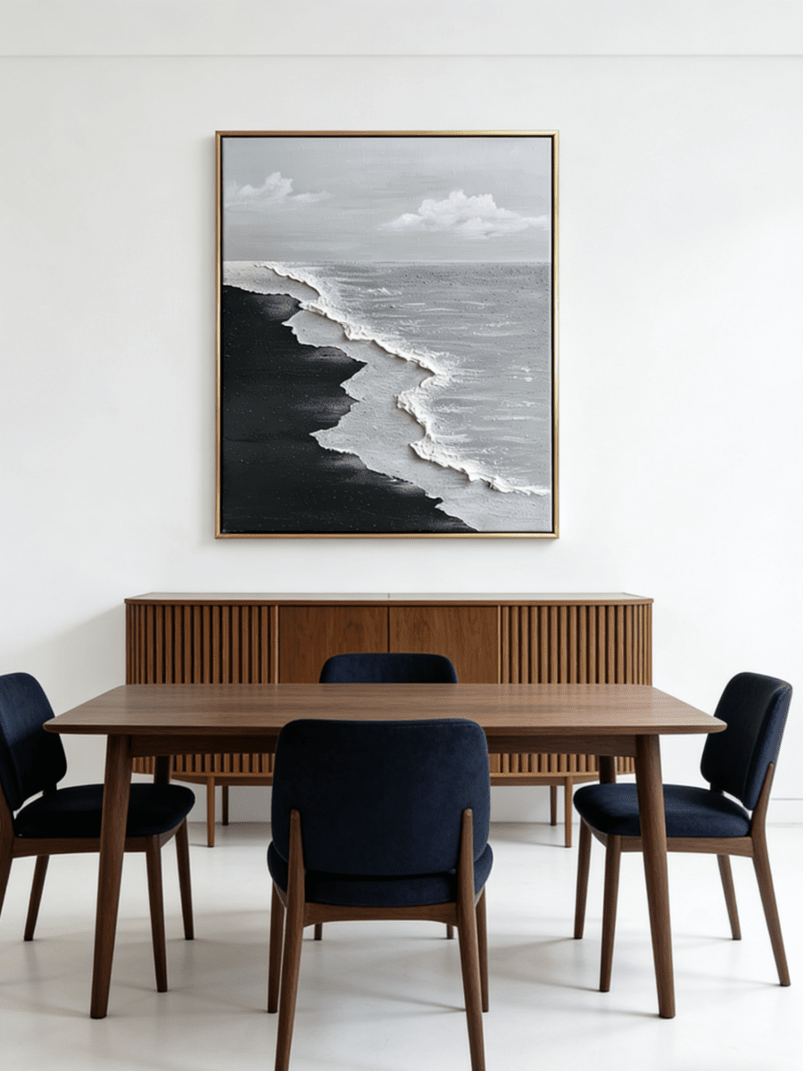 Close-up of a hand-painted 3D textured black sand beach painting with heavy white sculpted seafoam and black waves in a black frame.