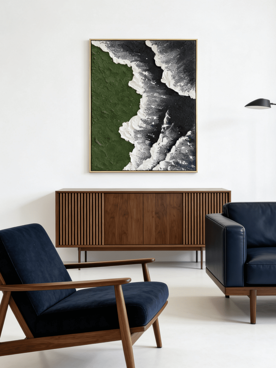 Close-up of a hand-painted 3D textured abstract painting featuring heavy white sculpted foam over moss green and black backgrounds in a gold frame.