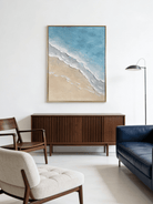 Hand-painted 3D textured beach painting with thick white sculpted seafoam ridges and deep blue water in a gold floater frame.