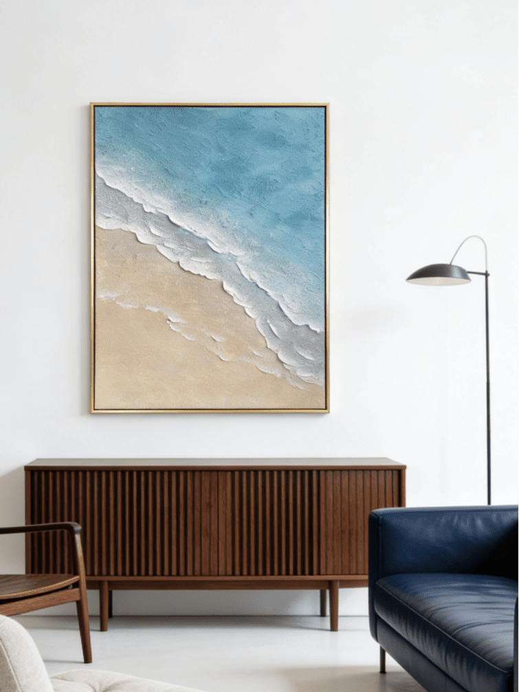 Hand-painted 3D textured beach painting with thick white sculpted seafoam ridges and deep blue water in a gold floater frame.