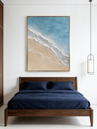 Hand-painted 3D textured beach painting with thick white sculpted seafoam ridges and deep blue water in a gold floater frame.