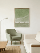 Close-up of 3D hand-painted textured ocean waves in sage green and olive, showing thick white sculpted seafoam ridges on canvas.