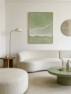 Close-up of 3D hand-painted textured ocean waves in sage green and olive, showing thick white sculpted seafoam ridges on canvas.