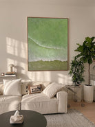 Close-up of 3D hand-painted textured ocean waves in sage green and olive, showing thick white sculpted seafoam ridges on canvas.