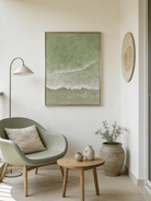 Close-up of 3D hand-painted textured ocean waves in sage green and olive, showing thick white sculpted seafoam ridges on canvas.