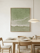 Close-up of 3D hand-painted textured ocean waves in sage green and olive, showing thick white sculpted seafoam ridges on canvas.