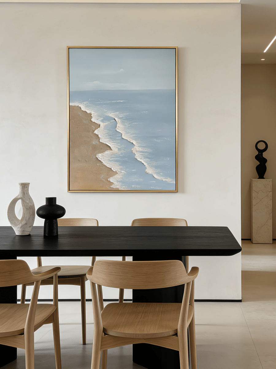 Large vertical hand-painted blue ocean painting with 3D textured white foam waves and sandy beach by Leo Liang in a bright modern bedroom.
