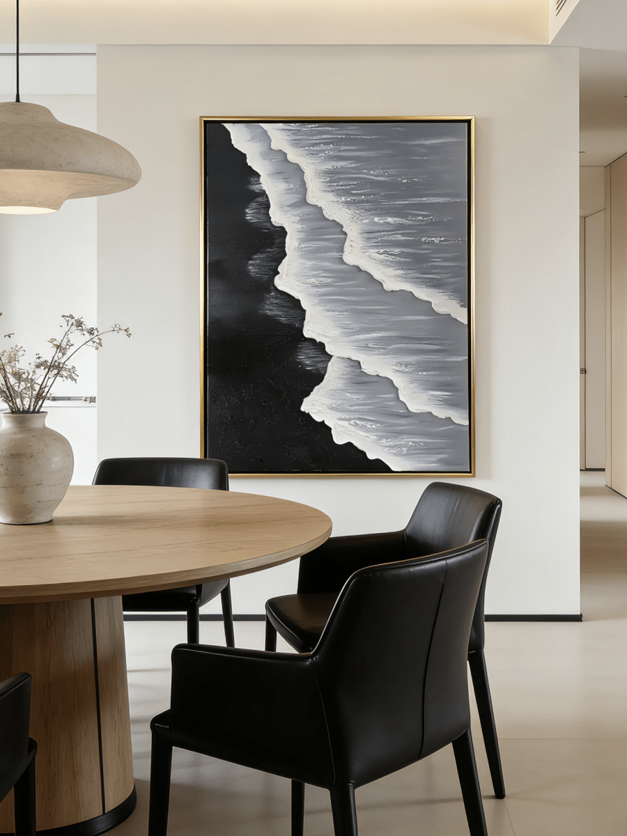 Large vertical hand-painted black sand beach seascape with heavy 3D textured white waves and grey ocean by Leo Liang in a modern living room.