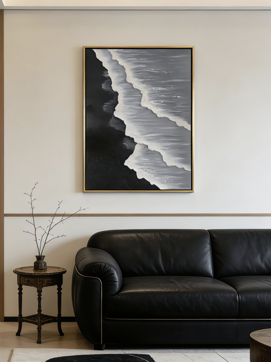 Large vertical hand-painted black sand beach seascape with heavy 3D textured white waves and grey ocean by Leo Liang in a modern living room.