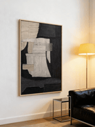 Minimalist abstract wall art displayed in contemporary living room, showcasing irregular shapes composition in modern home decor