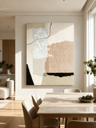 Contemporary living room wall decor featuring abstract painting with irregular shapes composition in modern interior setting