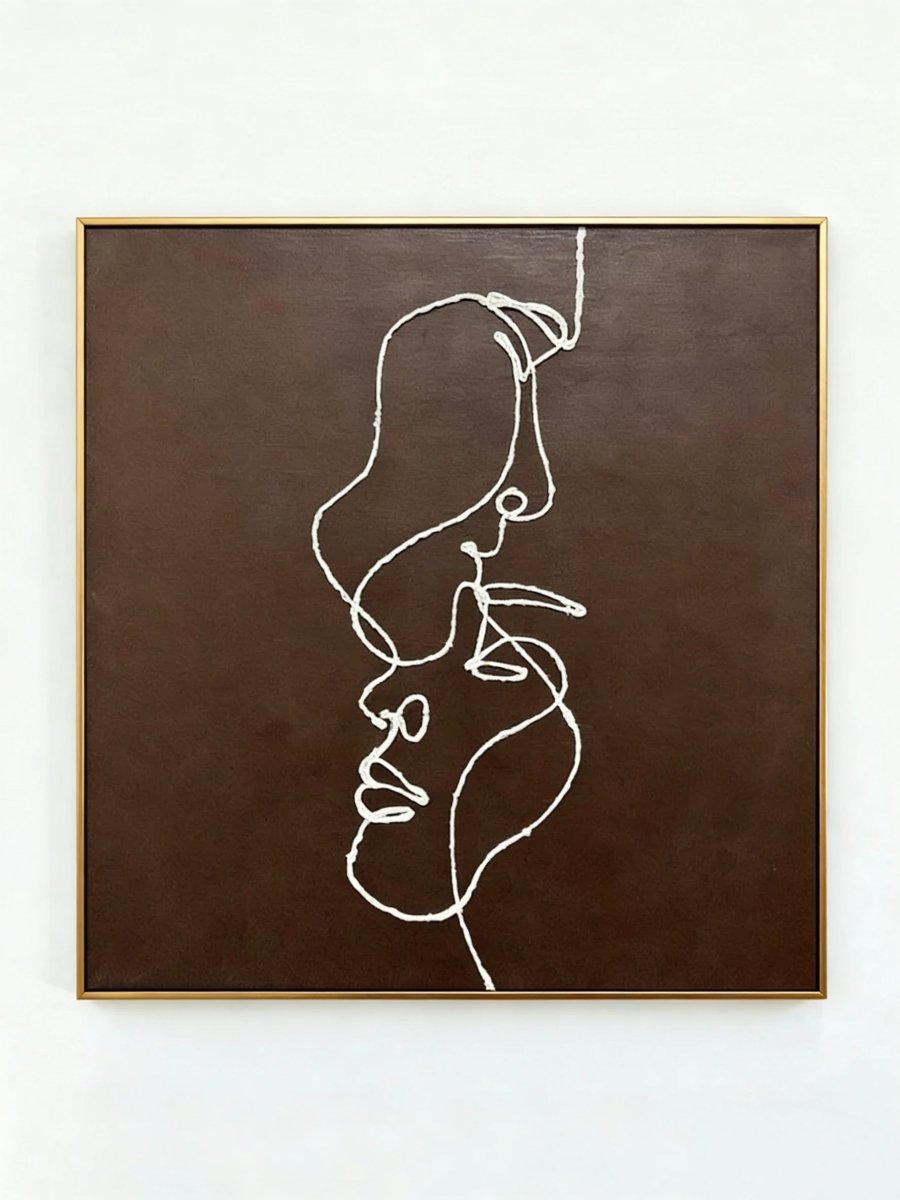 hand-painted 3D textured line art of two faces on coffee brown canvas, minimalist abstract couple painting for bedroom wall decor.