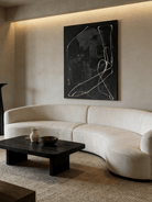 Modern hand-painted abstract canvas with white flowing lines on a textured black background