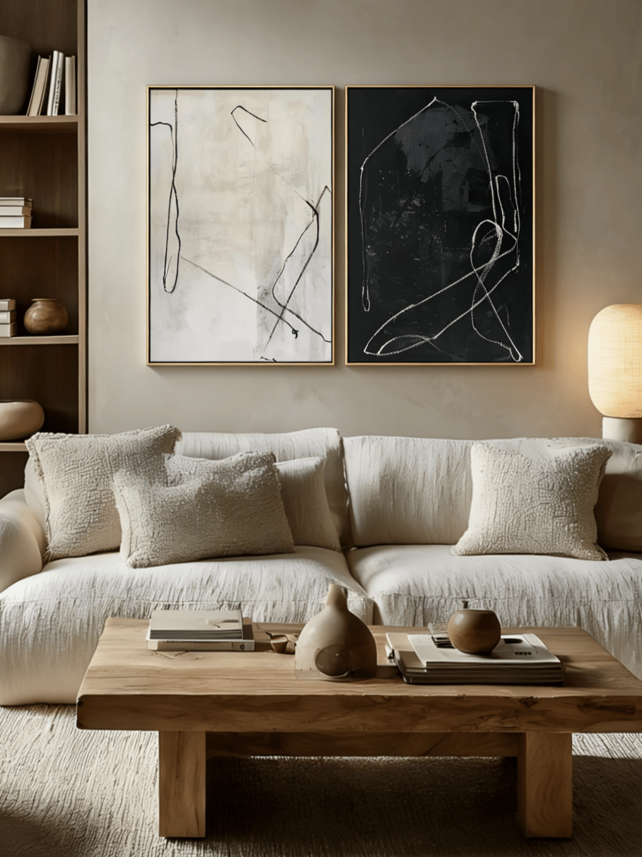 Pair of large hand-painted abstract paintings with white lines on black and black lines on white background, modern gallery-style diptych