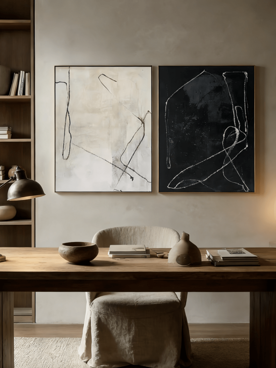 Pair of large hand-painted abstract paintings with white lines on black and black lines on white background, modern gallery-style diptych