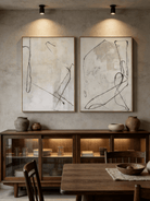 Large hand-painted abstract line art diptych in black and white, modern wall decor set for luxury living room.