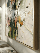 Vertical 3D textured floral painting showing heavy impasto orange and pink flowers on a white background in a modern bedroom.