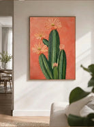 Large 100% hand-painted modern boho Southwestern cactus canvas painting with heavy 3D palette knife textured peach pink flower petals over a warm terracotta background by Luna Xiao for living room decor.