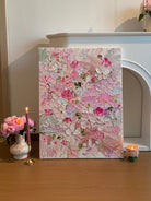 Hand painted 3D textured pink floral wall art with raised blossom petals on canvas by Luna Xiao