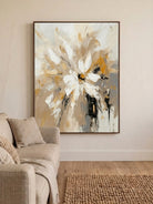 Large hand-painted modern abstract canvas painting with 3D heavy palette knife texture featuring a gold and white floral burst by Luna Xiao for luxury living room decor.