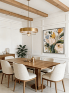 Large square 3D textured floral painting showing heavy impasto yellow and peach flowers on a white background in a modern bright living room.