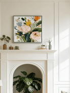 Large square 3D textured floral painting showing heavy impasto yellow and peach flowers on a white background in a modern bright living room.