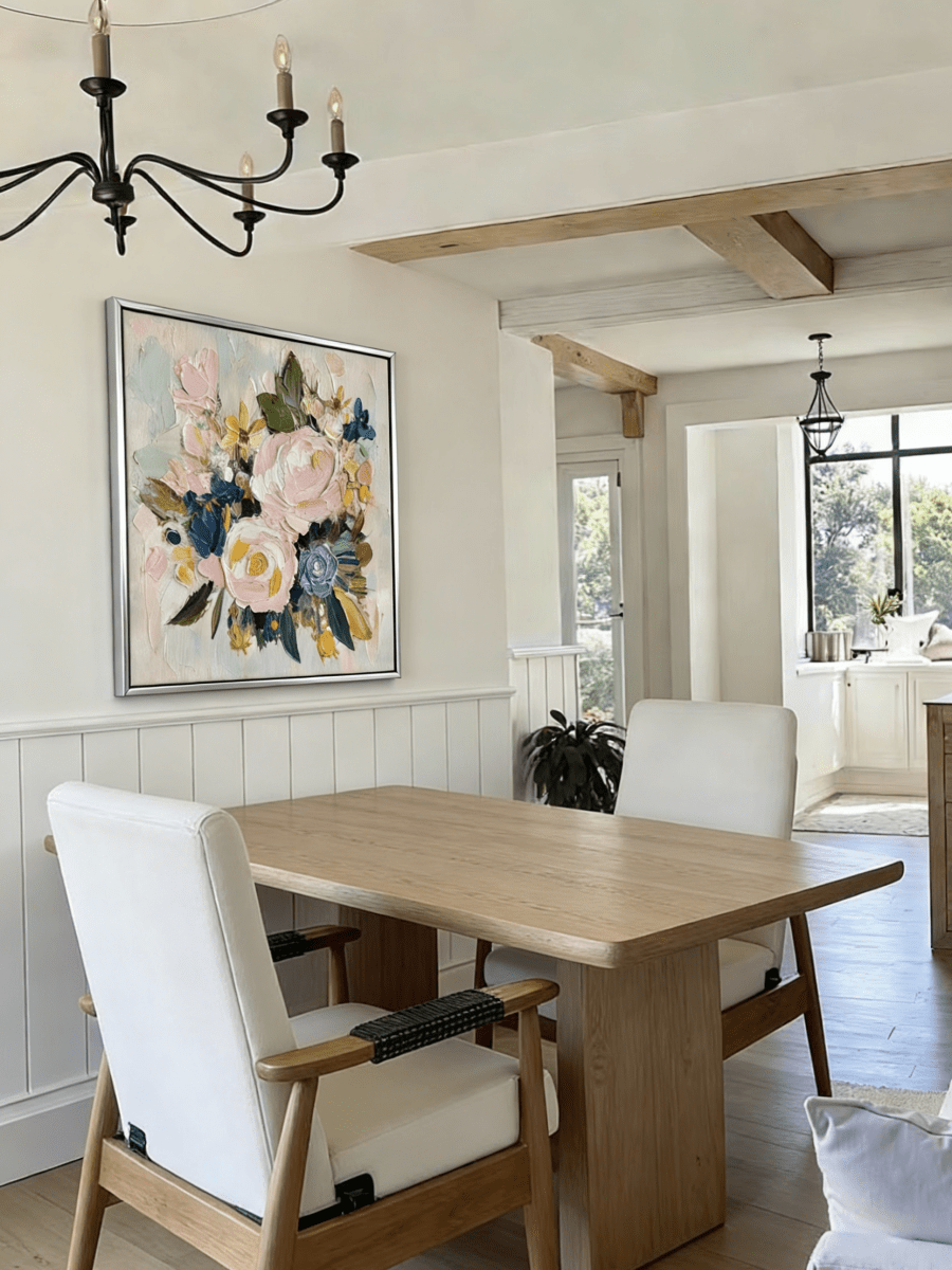 Large square 3D textured floral painting featuring heavy impasto pink and blue flowers in a modern luxury living room.