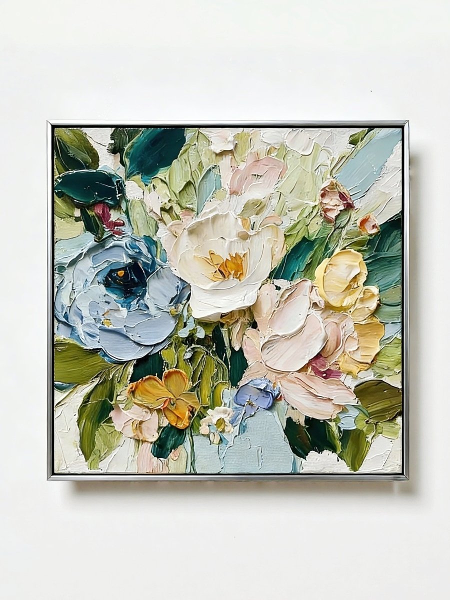 Large square 3D textured floral painting showing heavy impasto green and white flowers in a modern bright living room.