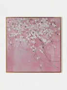 Close-up of large 3D textured abstract painting showing heavy white and taupe impasto ridges on canvas in a luxury living room.