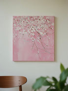 Close-up of large 3D textured abstract painting showing heavy white and taupe impasto ridges on canvas in a luxury living room.