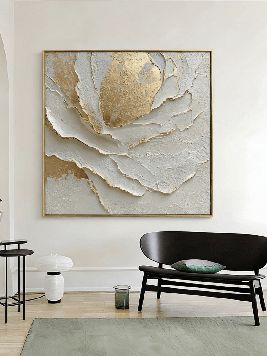 Macro shot of heavy 3D impasto texture on a white and gold abstract painting by Luna Xiao, showing deep sculptural ridges and gold leaf reflections.