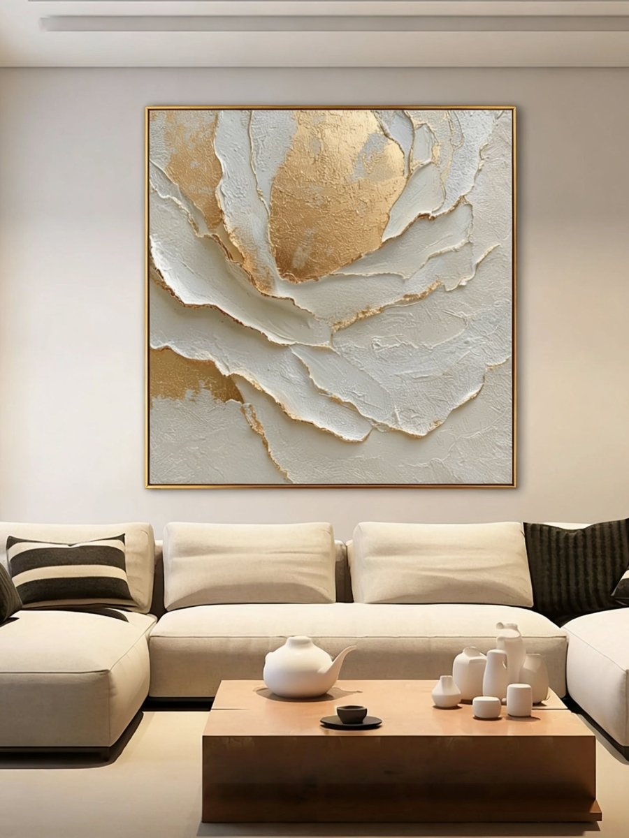 Macro shot of heavy 3D impasto texture on a white and gold abstract painting by Luna Xiao, showing deep sculptural ridges and gold leaf reflections.