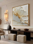 Large square 3D textured white floral oil painting with gold leaf edges, hand-sculpted flower wall art by Luna Xiao for bedroom.