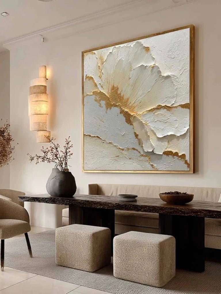 Large square 3D textured white floral oil painting with gold leaf edges, hand-sculpted flower wall art by Luna Xiao for bedroom.