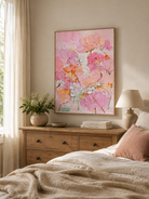Pink and peach 3D flower painting displayed in a cozy bedroom
