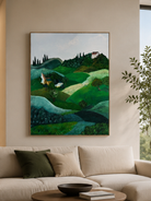 Tuscan green landscape painting displayed above neutral furniture in an organic modern living room