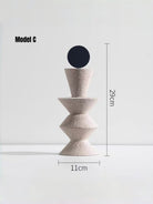 abstract geometric resin sculpture with sandstone texture, minimalist cream and black totem for modern home office shelf decor.