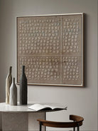 Wabi-Sabi textured circle wall art displayed in a modern living room, showcasing minimalist home decor