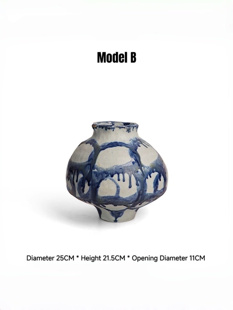 blue and white abstract drip glaze ceramic vase, hand-painted ink-wash style pottery sculpture for modern living room console.