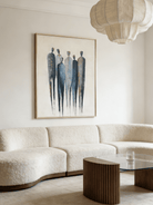 A hand-painted minimalist abstract painting of six tall figures in blue and grey on a white background with gold leaf accents