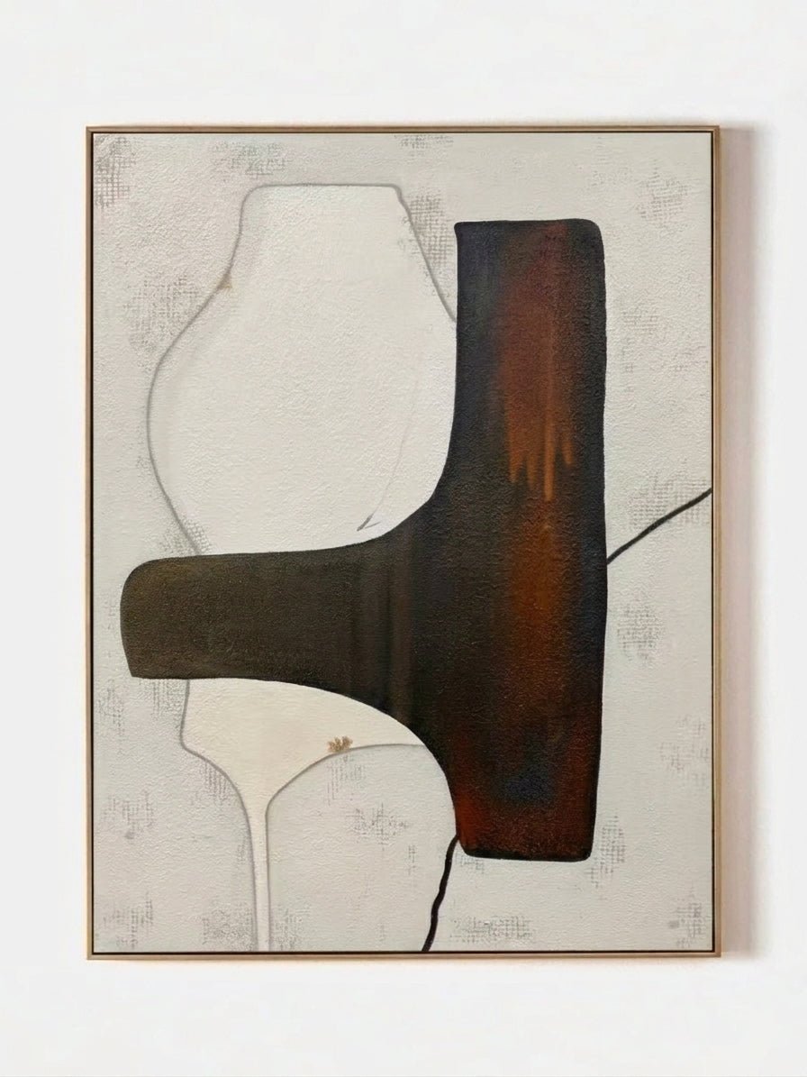 Hand-painted organic modern abstract painting featuring stone-textured background, brown and black shapes in a gold floater frame.