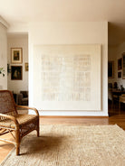 Silver textured wall art displayed in modern living room, showcasing Wabi-Sabi aesthetic in home decor